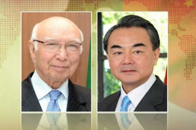 Sartaj Aziz and Wang Xi