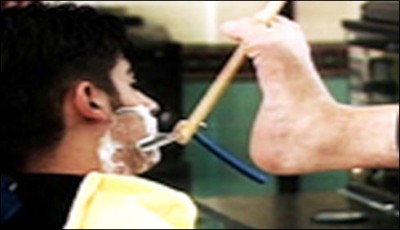 Mouth and foot caught in the razor to shave