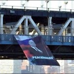 Lhradya banners unidentified New York Bridge Putin