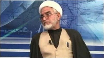 Allama Mirza Yousuf in court on charges of hate speech