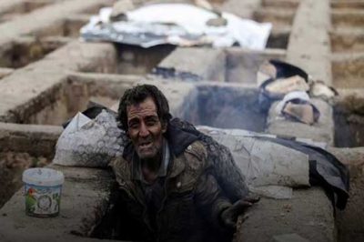 Iranian citizens living on the grave-like holes