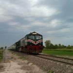 Peshawar to Karachi crossing the railway tracks the gates and signage to become execute