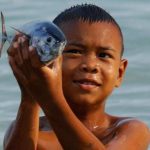 childrens Look like fish swimming in the sea
