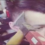 Morocco: the barber cutting hair with hammer and ax