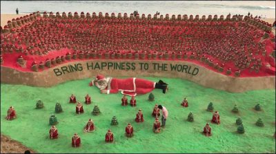 Indian artist set up of Santa Claus from sand