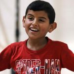 Lost both arms Syrian children looking for his Parents in Usa