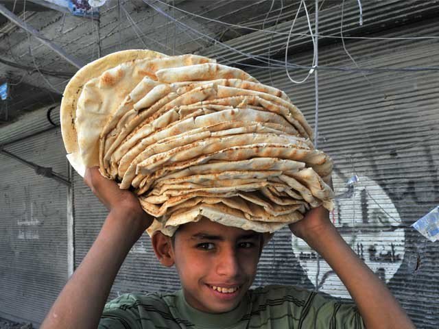 Getting up bread camp which names Pakistan Bakery in Syrian city Aleppo