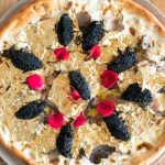 Pizza wrapped in gold foil