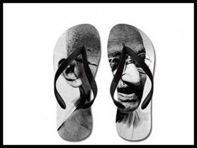 US online website on Amazon selling sandals with Gandhi's image