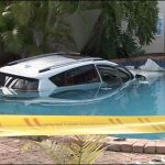 Australia: The woman plunge into the swimming pool with her new car