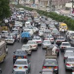 Locomotive and freight car was on the road, the traffic jam on the highway Faisal