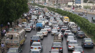 Locomotive and freight car was on the road, the traffic jam on the highway Faisal