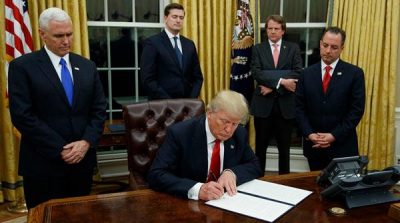 Trump's first war on Obama Care, first executive order issued