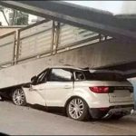 China woman was hit new car to Pedestrian bridge
