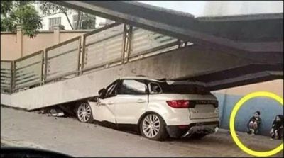 China woman was hit new car to Pedestrian bridge