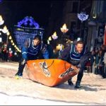 Races of small boats conducting on ice in Quebec City