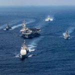 AMERICA, SENDS, ITS, FIGHTER, SHIP, TOWARDS, ISLAND, OF, KOREA