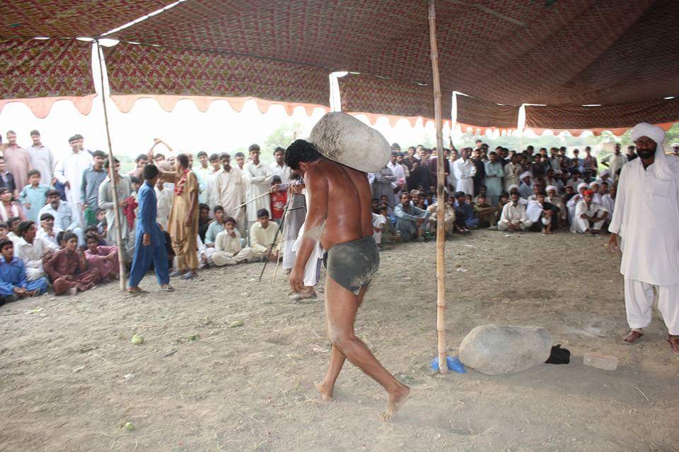 Stone carries a centuries-old traditional game