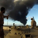 Attack on military airbase in Libya, killing 141 people, including officials