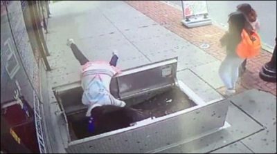 Woman, fall ,several, feet, down, while ,using, mobile ,phone