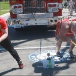 Canada, two, wrestlers, set, a , new, world, record, by, moving, fighter, truck,