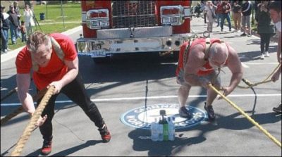 Canada, two, wrestlers, set, a , new, world, record, by, moving, fighter, truck,