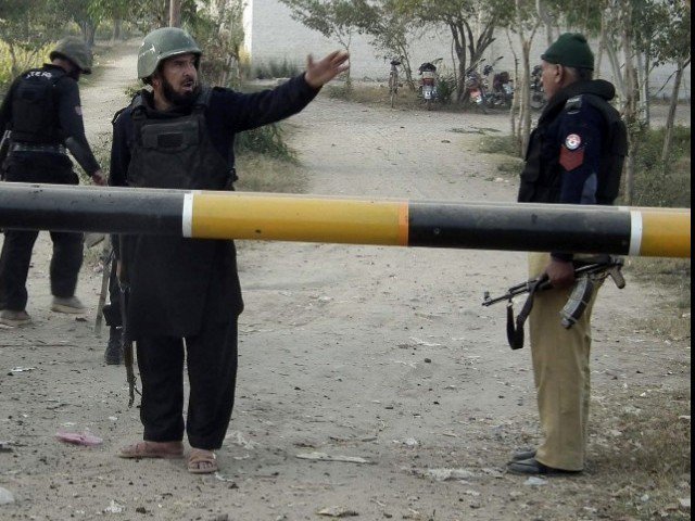Two killed by firing on police in Mardan