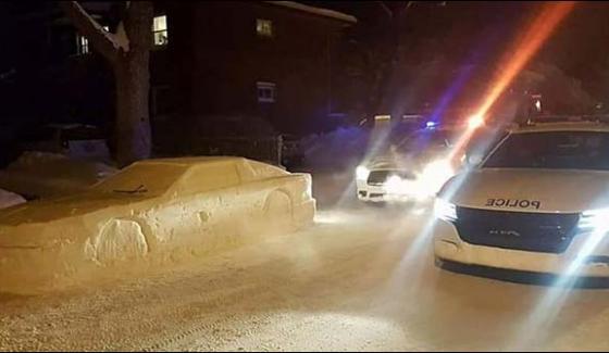 Car in wrong parking made out of snow gets in Montreal