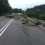 Land slides in Malaysia changed the road to a deep pit