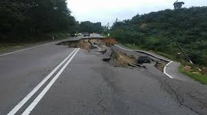 Land slides in Malaysia changed the road to a deep pit