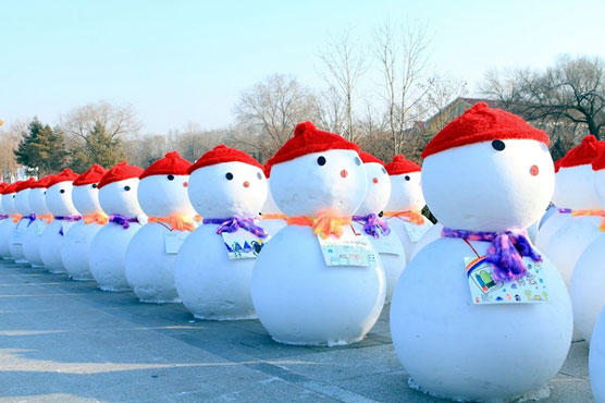 Thousands of snowman arrival in the Harbin Ice Festival