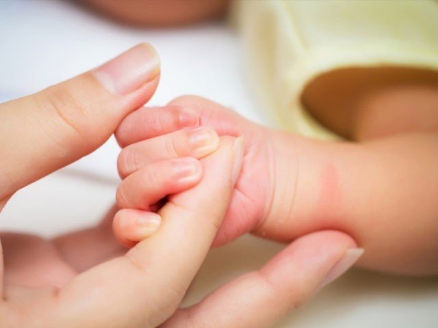 Mother bought her baby to buy a aeroplane ticket