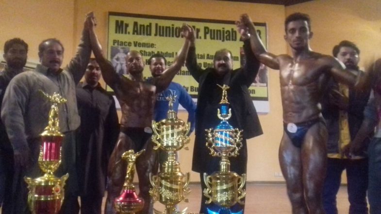 CHAIRMAN MIXED MARTIAL ARTS MMA, CHAIRMAN KYOKUSHIN PAKISTAN FEDRATION, PRESIDENT SO-KIYOKUSHIN KRATE ORGANIZATION PAKISTAN AND CEO RAJA'S MARTIAL ARTS AND FITNESS GYM BEHRIA TOWN ISLAMABAD DISTRIBUTING AWARDS DURING THE MR. PUNJAB BODYBUILDING CHAMPION SHIP HELD AT ISLAMABAD ON SUNDAY MORNING ORGANIZED BY CHIEF ORGANIZER FORMER WORLD CHAMPION AHMED SADIQ PAKISTAN AMATEUR BODYBUILDING ASSOCIATION.