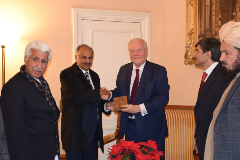Pakistan delegation is giving souvenir to Senator Cambon of France