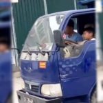 7-year-old child's excursion the city to running truck