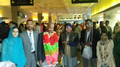 RE-KNOWN, PERSON, AND, SOCIAL, WORKER, DR. ATHAR, ALI, RETURNED, AFTER, PERFORMING, UMRAH, ON, AIRPORT, FRIENDS, AND, FATHER, DR. MUBARAK, ALI, RECEIVED, HIM