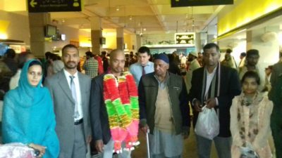 RE-KNOWN, PERSON,  AND, SOCIAL, WORKER,  DR. ATHAR, ALI, RETURNED, AFTER, PERFORMING, UMRAH, ON, AIRPORT, FRIENDS, AND, FATHER, DR. MUBARAK, ALI, RECEIVED, HIM