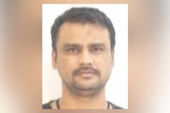 MQM's alleged target killer surrounded by Mama Chairman