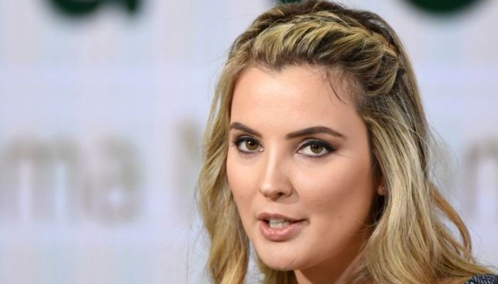 Brazil's first lady jumped to the lake to save a pet dog