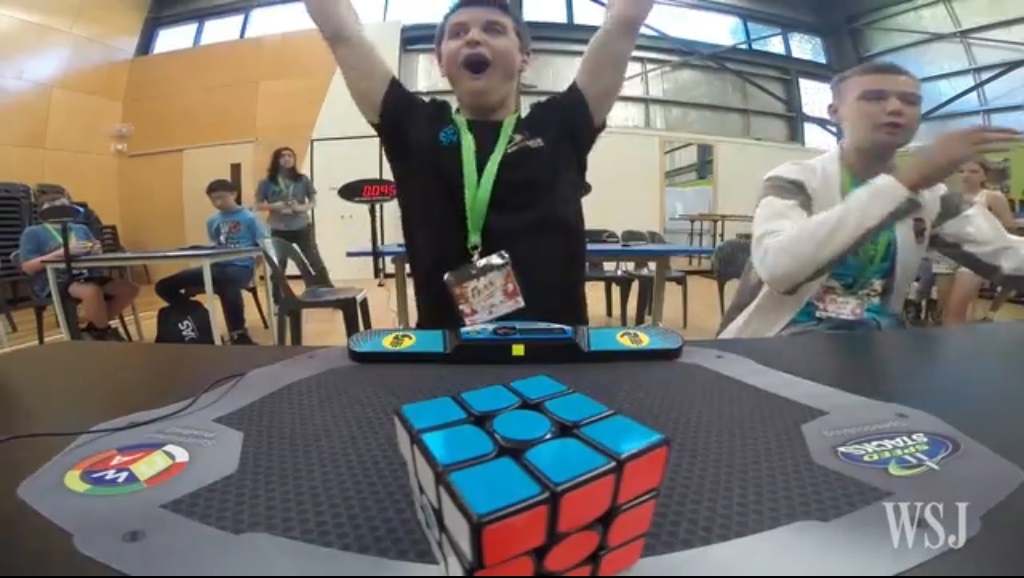 World record to solve rubik cube in less time