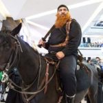 Actors arrival of shopping mall in the dress of ISIS, people screaming