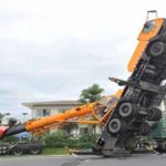 China: Crash mounted on a truck destroyed a crash, motorcycle and truck, driver died