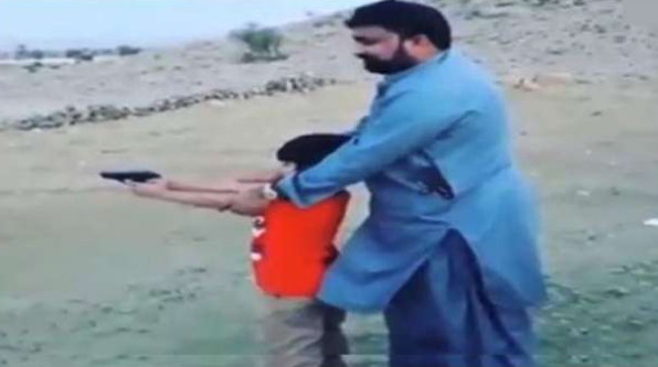 Balochistan Interior Minister throws fire weapons in his childrens hands, but why?