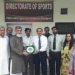 Vice Chancellor Arid University Prof. Dr Sarwat Naz Mirzi presenting a sheild on retirement of Director sports AGHA Saleem Khliji almaroof peer agha ji sarkar