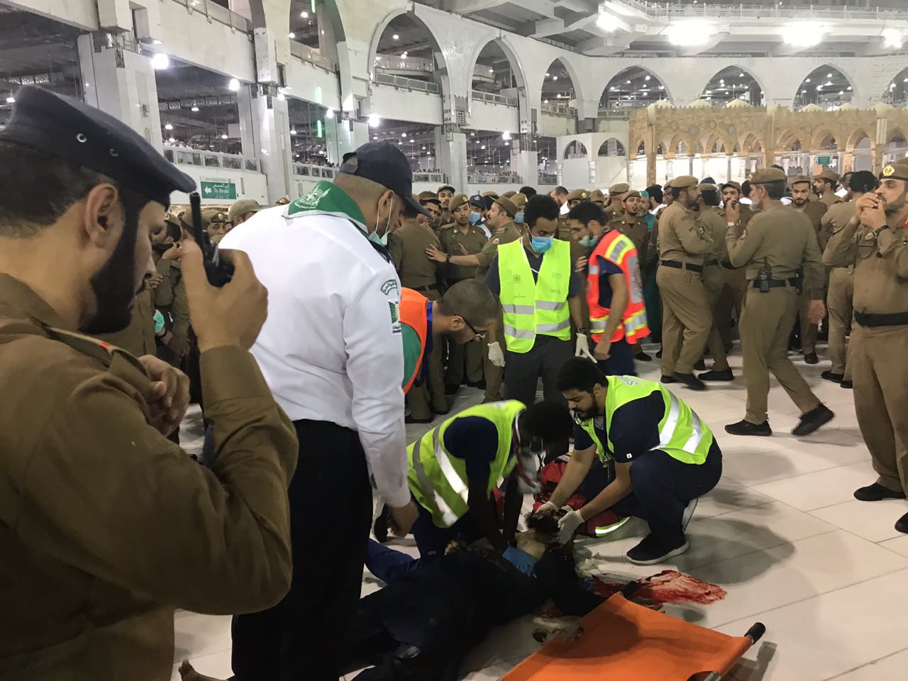 A, Pakistani, aged, about ,35, years, old, jumped, from ,the, top, roof, of, KHANA KAABA ,and ,died, at, the, spot