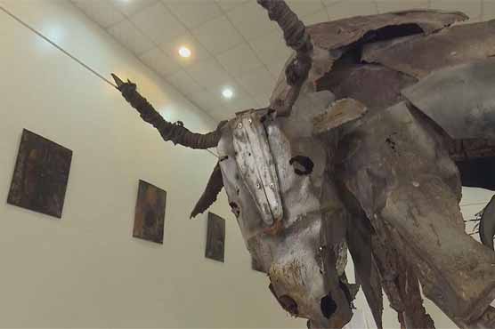 Afghan artists sculpt up with pieces of bombs