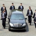 Head of the North Korea car racing guards guard the world