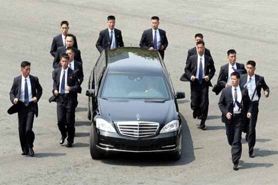 Head of the North Korea car racing guards guard the world