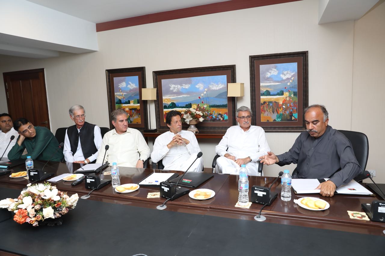 Chairman of the Tehreek-e-Insaf Imran Khan meeting with member of PTI Election Management Cell