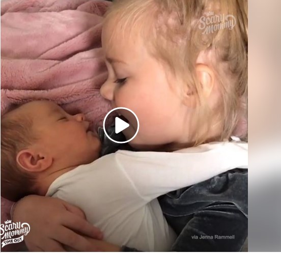 Little Girl Sings Her Baby Sister To Sleep With A Lullaby